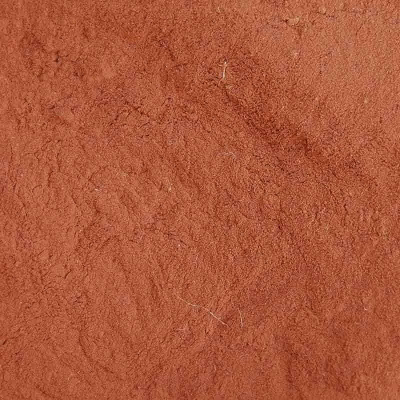 Vollbild Rotbraunes Catechupulver zum Pflanzenfärben von Naturfasern wie Wolle und Seide