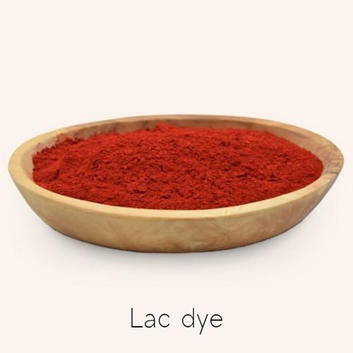 Rotes Lac dye in einer Olivenholzschale