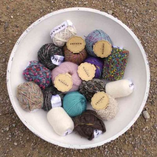 Viele verschiedene Art-Yarns von Masaki in einer Schale