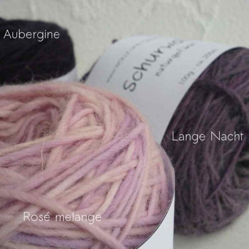 3 Knäuel Schurwolle, naturgefärbt, in rosa und lila